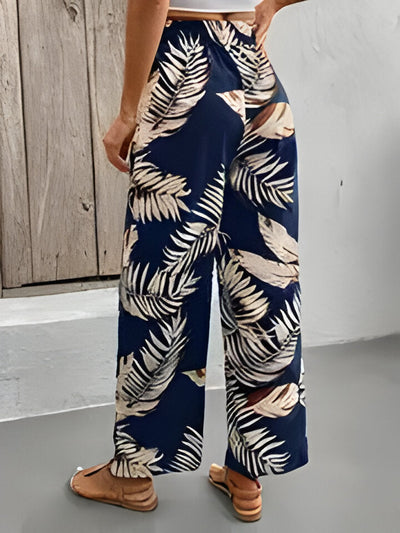 Camilla | Weit geschnittene Hose mit Blumendruck und Kordelzug