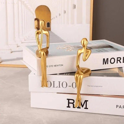 MindMuse – Goldene abstrakte Denkerstatuen in einzigartigen künstlerischen Positionen