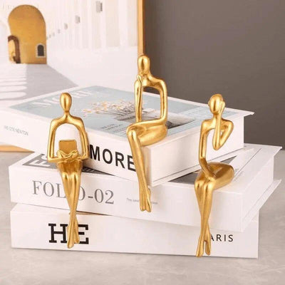 MindMuse – Goldene abstrakte Denkerstatuen in einzigartigen künstlerischen Positionen