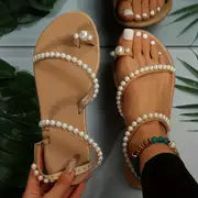 Thea | Elegante flache Damensandalen mit Perlenverzierung