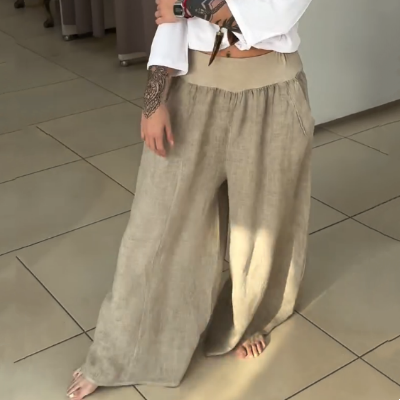 AMALIA - STRETCHHOSE MIT WEITEM BEIN UND TASCHEN